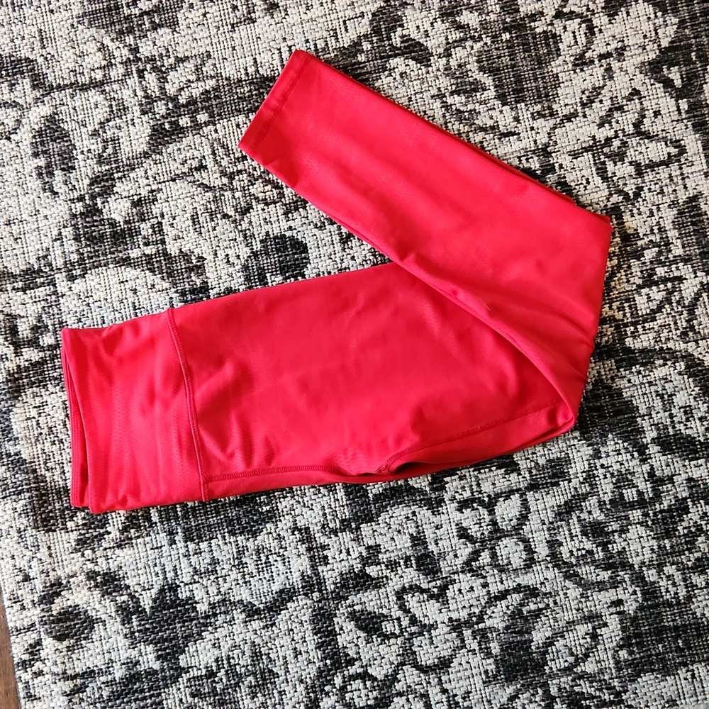 Red zyia light and tight size M 6-8